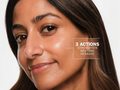 Close-up of a woman's face with text indicating '3 Actions: Strengthen, Restore, Hydrate' on a white background.