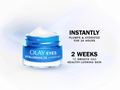 Olay Eyes cream jar with text on a light gray background
