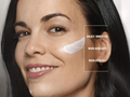 Woman applying cream to her face with text highlighting texture and feel