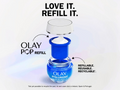 Olay Pop refillable skincare product with text 'Love it. Refill it.' on a light gray background.