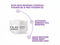 OLAY anti-wrinkle night cream with text highlighting skin renewal complex on a white background