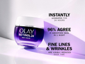 Olay Retinol24 night cream jar with promotional text on a light background