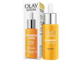 Olay serum bottles with packaging on a white background