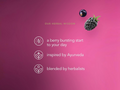 Product advertisement with blackberry and text on a pink background