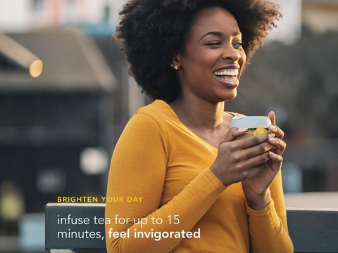 Woman in yellow shirt holding a product with text about tea benefits.