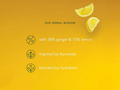 Yellow background with lemon slices and text about herbal wisdom, ginger, and lemon content.
