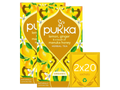 Pukka lemon, ginger, and manuka honey herbal tea packaging on a white background