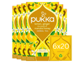 Pukka lemon, ginger, and manuka honey herbal tea packaging on a white background