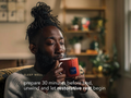 Man holding a mug with text about sleep preparation in a cozy room.