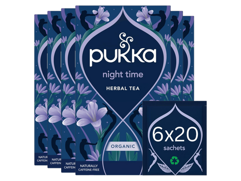 Pukka night time herbal tea packaging with floral design on a white background