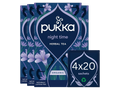 Pukka night time herbal tea packaging with floral design on a white background