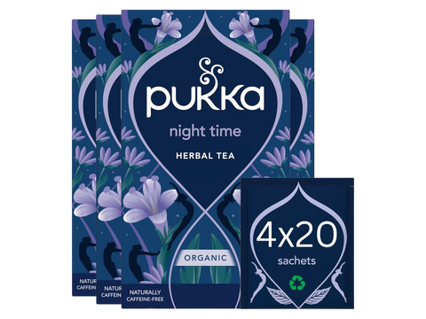 Pukka night time herbal tea packaging with floral design on a white background