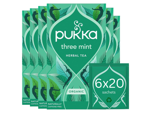 Pukka three mint herbal tea packaging with green design and visible branding.