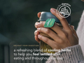 Person holding a jar labeled 'Pukka' with text about digestive health and herbs.
