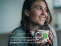 Woman holding a mug with text about digestive benefits