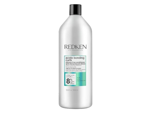 Redken Acidic Bonding Curls Concentrate Conditioner bottle, 1000ml, on white background.