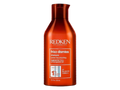 Redken Frizz Dismiss Shampoo bottle, sulfate-free, 300ml size on white background.