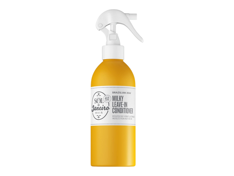 Yellow bottle with a white label on a white background