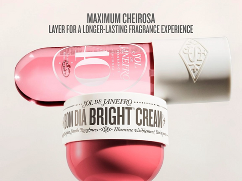Pink and white skincare product with text on a light background