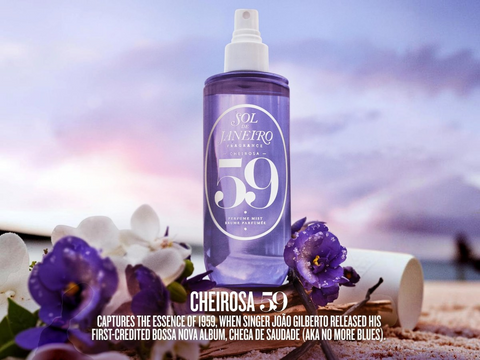 Bottle of Sol de Janeiro Cheirosa 59 perfume with flowers and a blurred background
