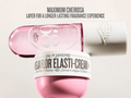 Pink jar of Sol de Janeiro Elastica Flor Elasti-Cream with white cap on a light background