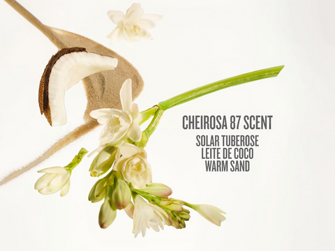 Coconut oil with tuberose flowers on a white background, featuring the Cheirosa 87 Scent description.