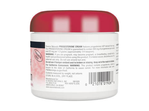 Back view of a Progesterone Cream jar with red lid and white body on a white background