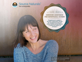Woman smiling with Source Naturals advertisement about hormone assistance for menopausal women.