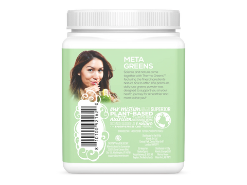 Container of Meta Greens with a woman's face on the label