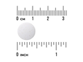 White pill with a ruler for scale on a white background