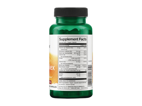 Green supplement bottle with label on a white background