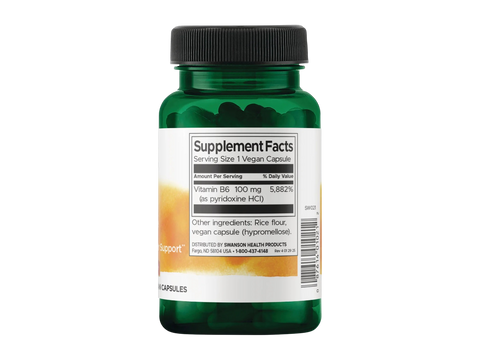 Green supplement bottle with label on a white background