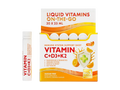 Box of liquid vitamins with a bottle on a white background
