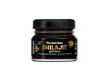 The Good Guru Shilajit Gold Resin with Herbal Blend in a 20g glass jar on a white background.