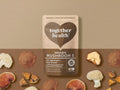 Together Health Organic Mushroom Complex 5 60 Capsules product pouch with mixed mushroom ingredients display