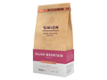 Coffee details, tasting notes, and brewing tips on bag.