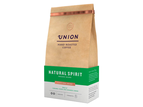 Coffee details, tasting notes, and organic certification on bag.