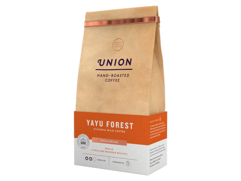 Coffee details, tasting notes, and conservation information on bag.