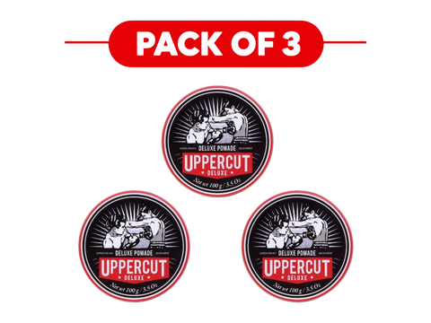 Three round tins of Uppercut Deluxe pomade arranged on a white background under a red banner that reads 'PACK OF 3'. The tins have black, white, and red labels showing the Uppercut logo and text.