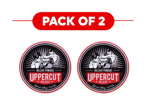 Two round tins of Uppercut Deluxe Pomade shown side by side with a red banner above reading 'PACK OF 2' on a white background.