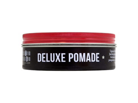 Uppercut Deluxe Pomade 100g side view showing product logo and 100g size