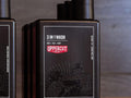 Uppercut Deluxe 3 in 1 Wash 240ml front view of all in one hair face and body wash bottle with branding