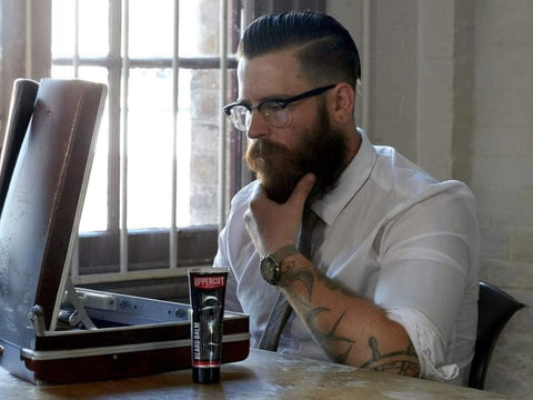 Uppercut Deluxe Beard Balm 100ml applied to beard for controlled natural finish