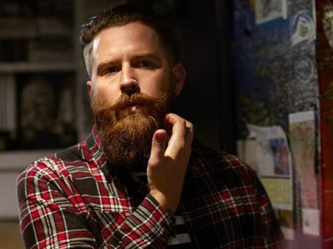 Uppercut Deluxe Beard Balm 100ml applied to beard for controlled natural finish