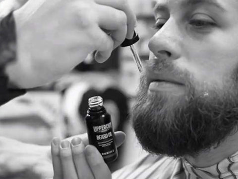 Uppercut Deluxe Beard Oil 30ml applied to beard showing groomed natural finish