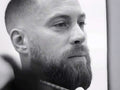 Uppercut Deluxe Beard Oil 30ml applied to beard showing groomed natural finish
