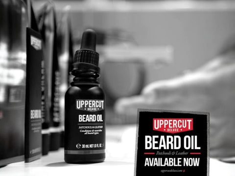 Uppercut Deluxe Beard Oil 30ml front view of beard conditioning oil bottle with branding