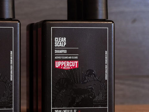 Uppercut Deluxe Clear Scalp Shampoo 240ml front view of shampoo bottle with branding