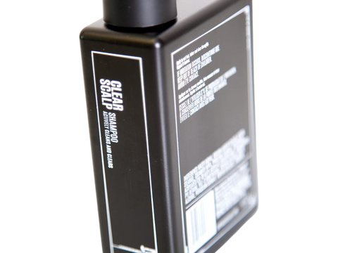 Uppercut Deluxe Clear Scalp Shampoo 240ml bottle side angled view showing 240ml size