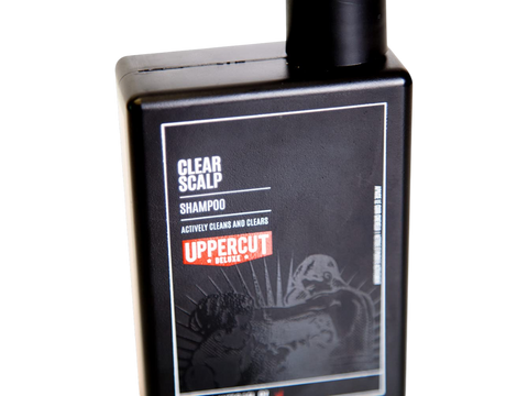 Uppercut Deluxe Clear Scalp Shampoo 240ml bottle angled view showing 240ml size